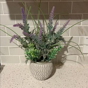 Lavender and Green Artificial Plant in Textured Pot